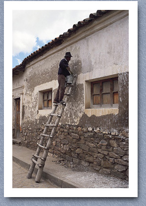 Man painting house, Tarabuco