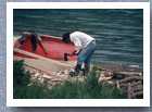 Repairing hull of boat, Puyuhuapi